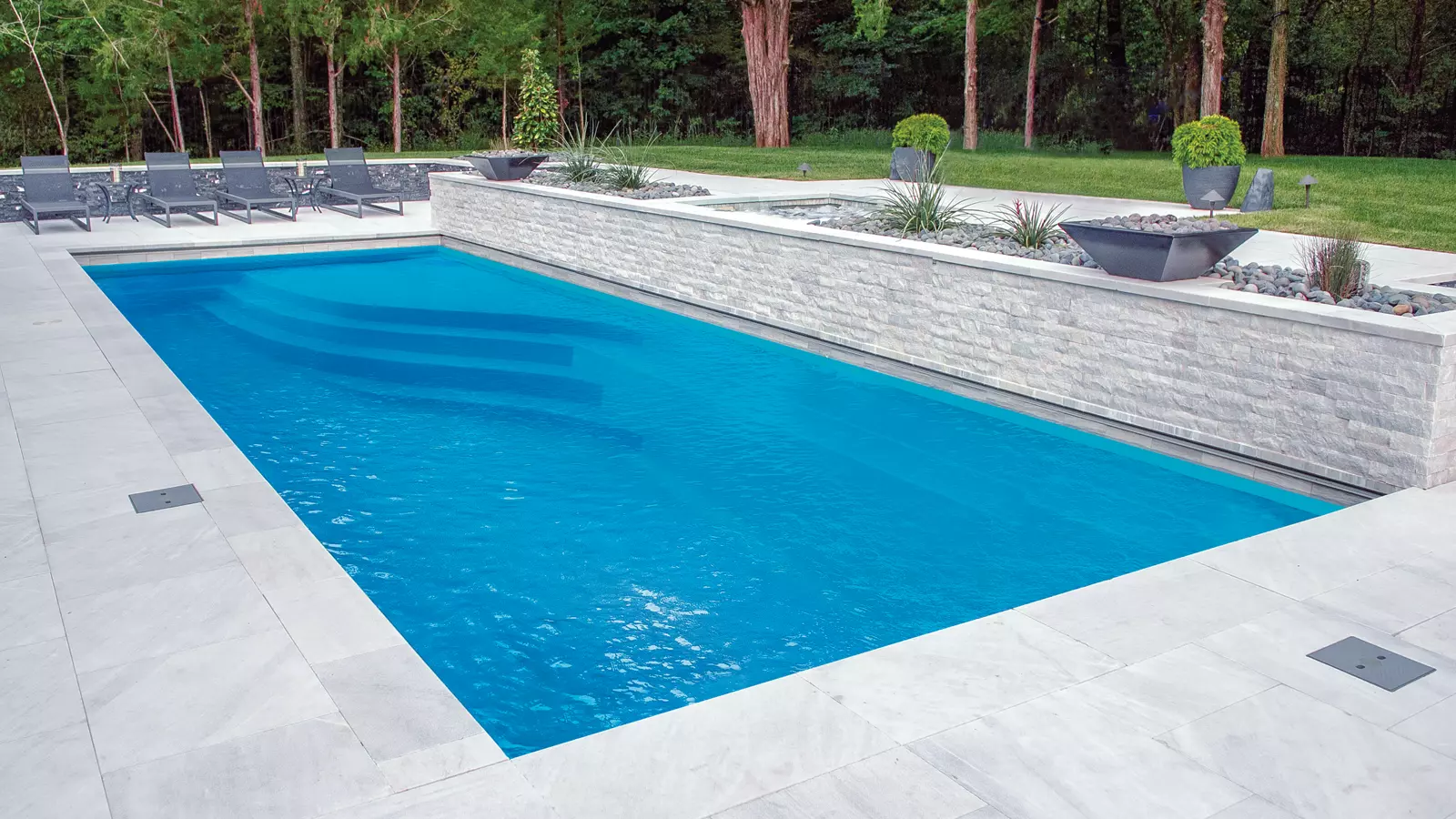The Wave™, a fiberglass pool design manufactured by Leisure Pools